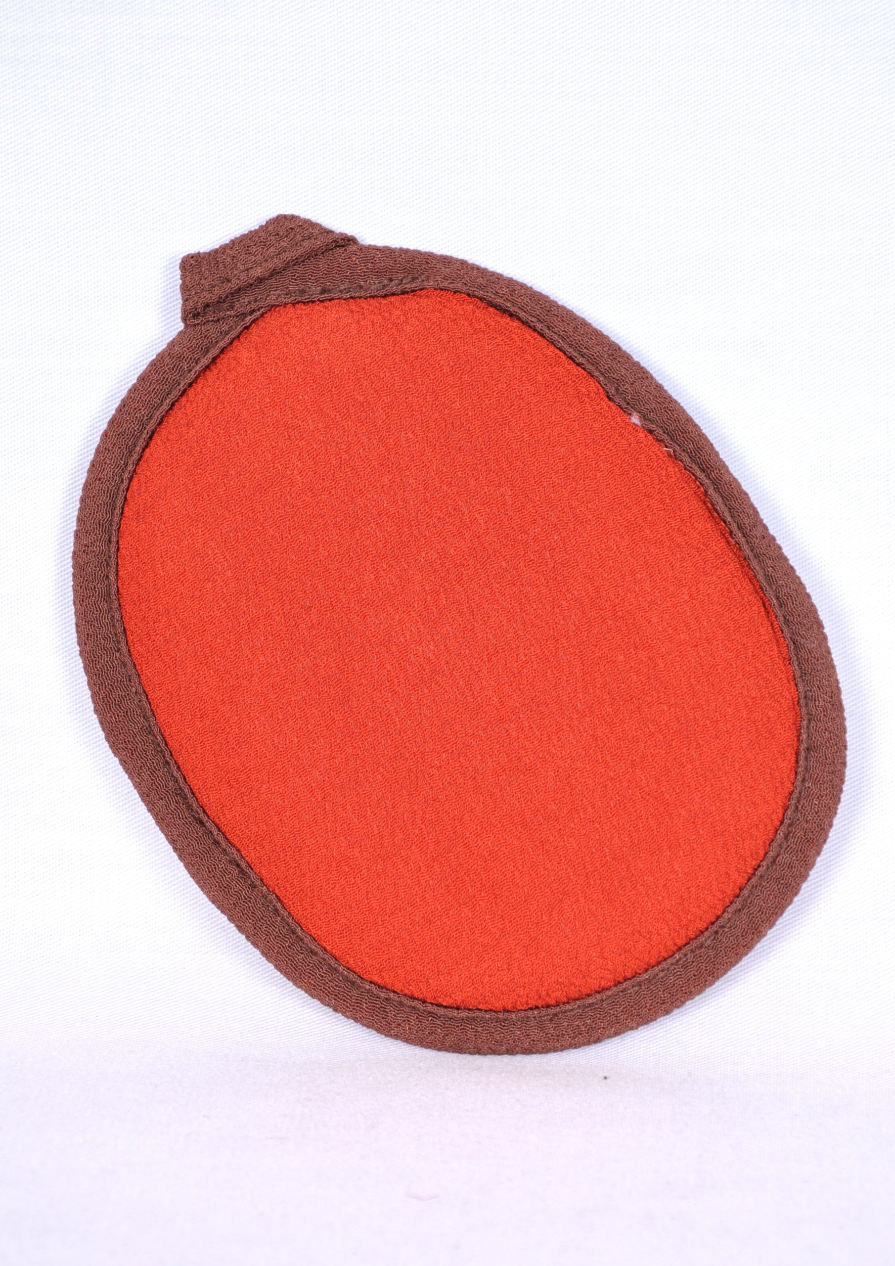 Gant de gommage pour le visage